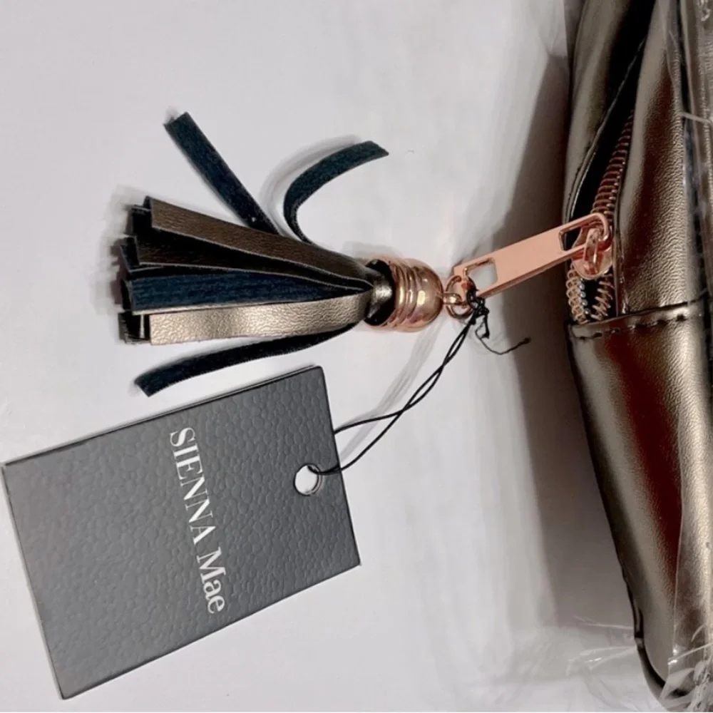 Sienna Mae Bronze Cosmetic Bag with Tassel New with tags!!